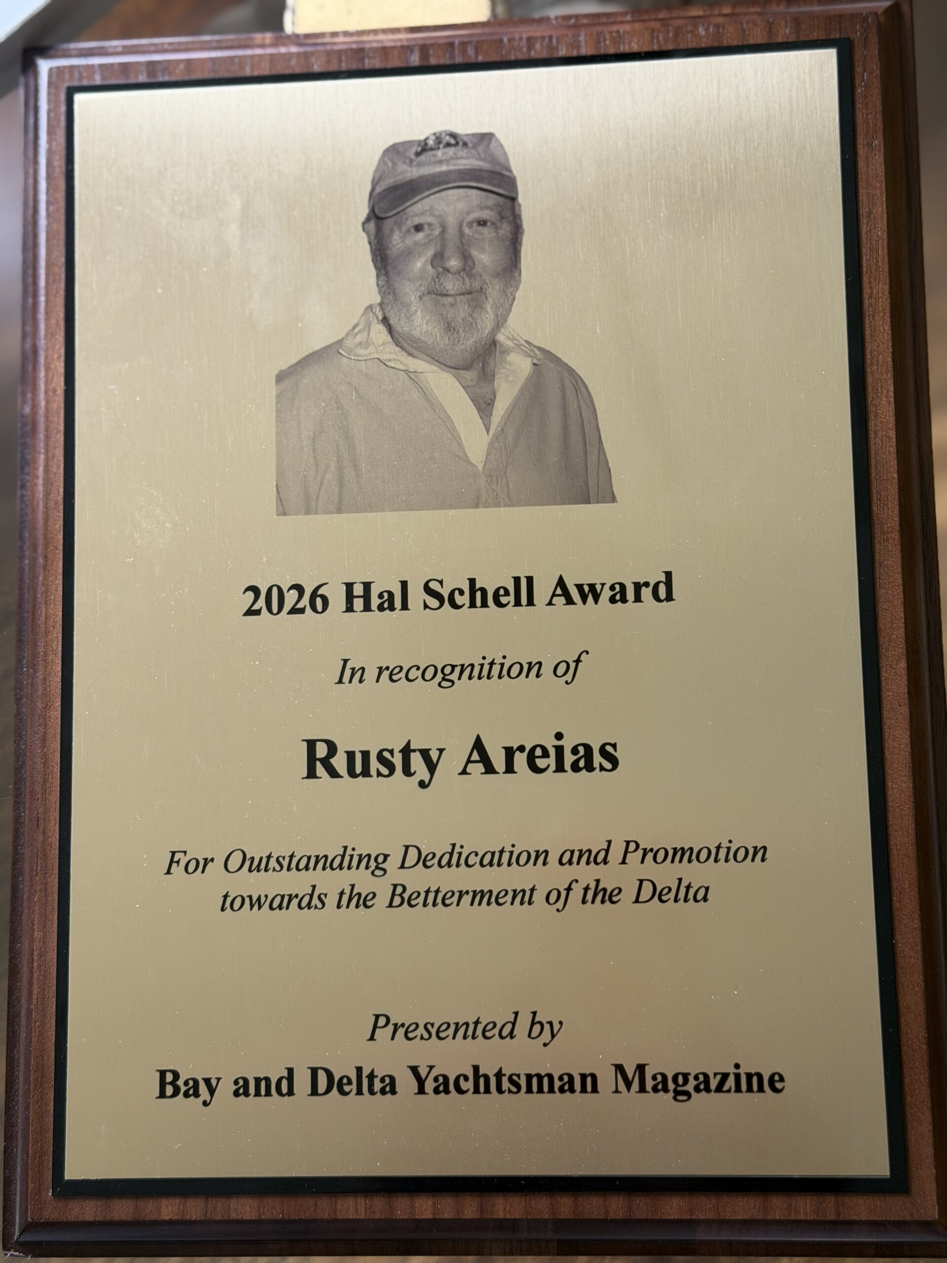 Close-up of the 2026 Hal Schell Award plaque presented to Rusty Areias.